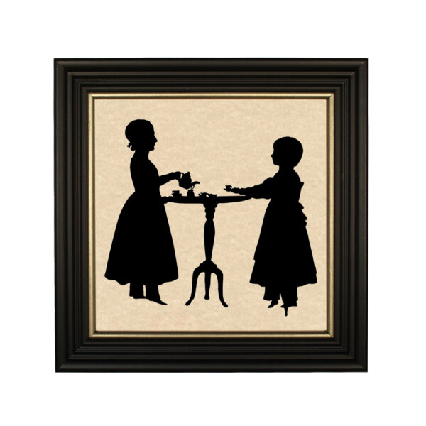 Sisters' Tea Party Framed Paper Cut Silhouette in Black Wood Frame with Gold Trim. An 8 x 8" framed to 10 x 10".