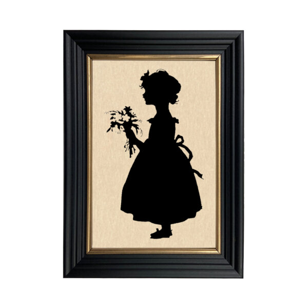 Girl with Flowers Framed Paper Cut Silhouette in Black Wood Frame with Gold Trim. Framed to 8-3/4 x 12".