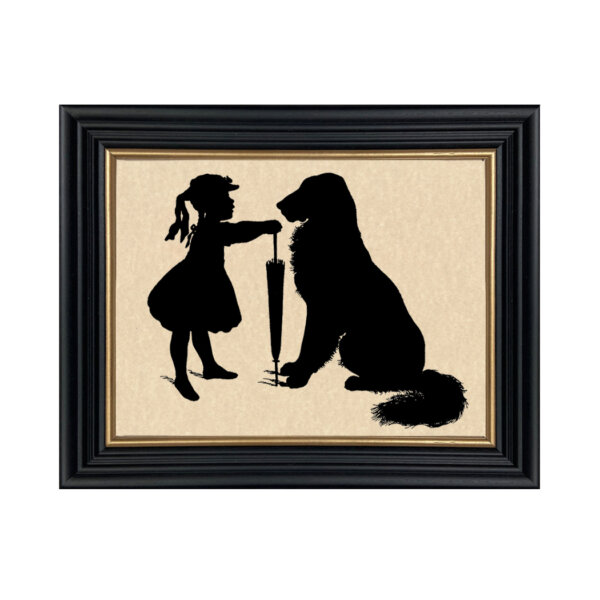 Early American Early American Girl with Dog Framed Paper Cut Silhouette in Black Wood Frame with Gold Trim. An 8 x 10″ framed to 10 x 12″.