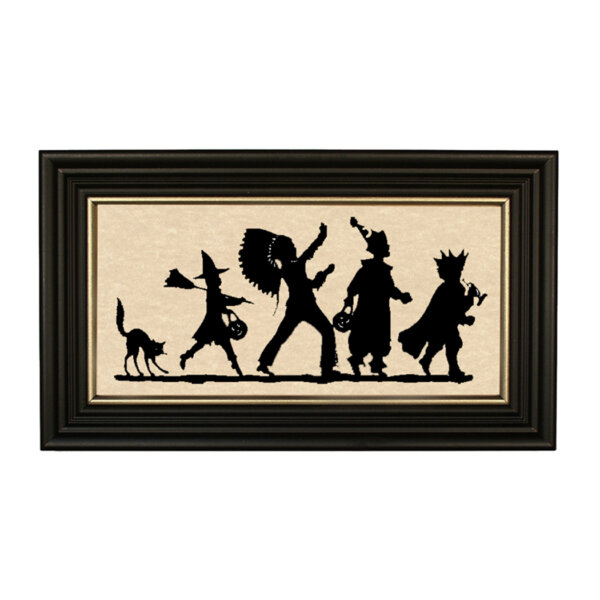 Halloween Parade Framed Paper Cut Silhouette in Black Wood Frame with Gold Trim. A 5" x 10" framed to 7" x 12".