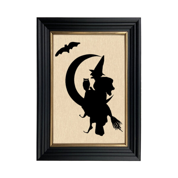 Framed Silhouettes Witch Over Moon Framed Paper Cut Silhouette in Black Wood Frame with Gold Trim. An 6-3/4 x 10″ framed to 8-3/4 x 12″.