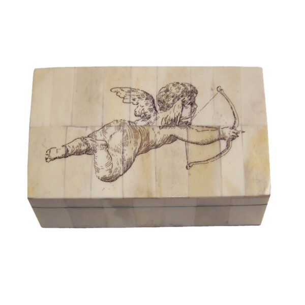 Scrimshaw/Bone & Horn Boxes Valentines 5-1/4 x 3-1/4 x 2″ bone box with removable lid etched with cupid and arrow. The interior is lined with felt.